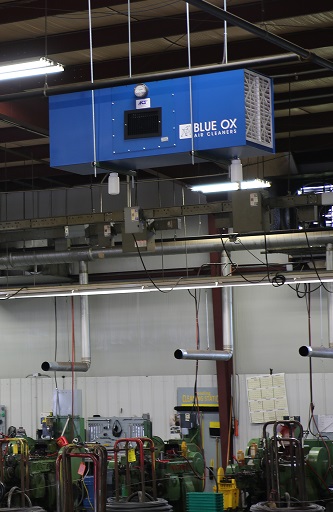 Blue Ox air filtration system installed in an industrial facility to help with oil mist control.