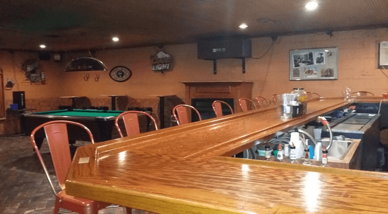 Blue Ox Air Cleaner shown installed in a bar to remove cigarette and tobacco smoke.