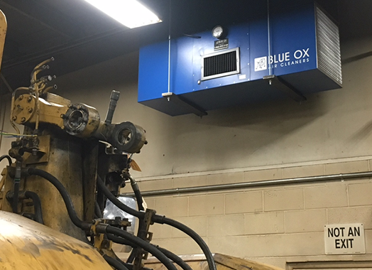 Blue Ox Air cleaning unit hanging in a welding and plasma cutting facility