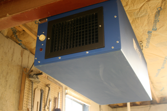 Blue Ox Air Cleaner shown in woodshop to collect wood dust.