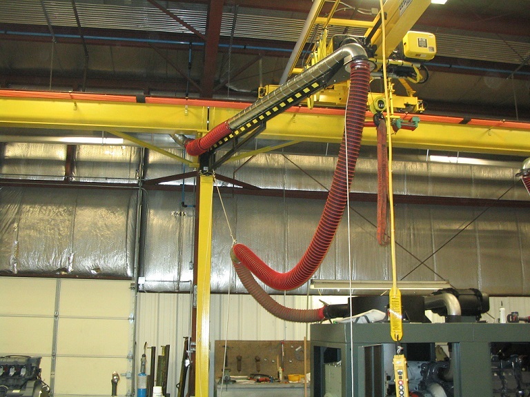 Diesel exhaust removal system installed at diesel engine repair facility.