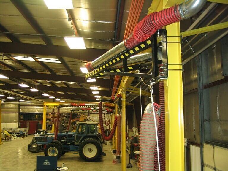 Diesel exhaust removal system installed at diesel engine repair facility.