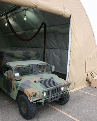 Rope and Pulley Simple Drop Systems installed to allow for dual exhaust in each military humvee repair and maintenance tent.