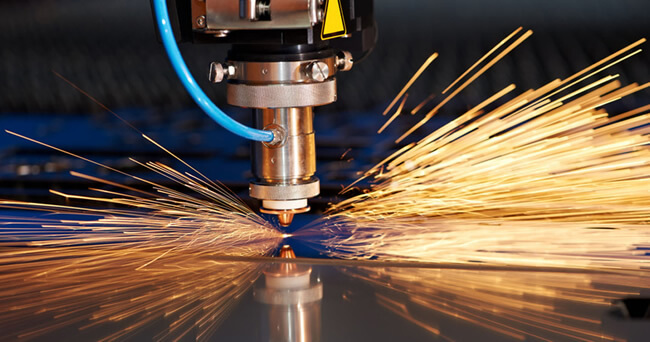 Sparks from a laser cutting machine