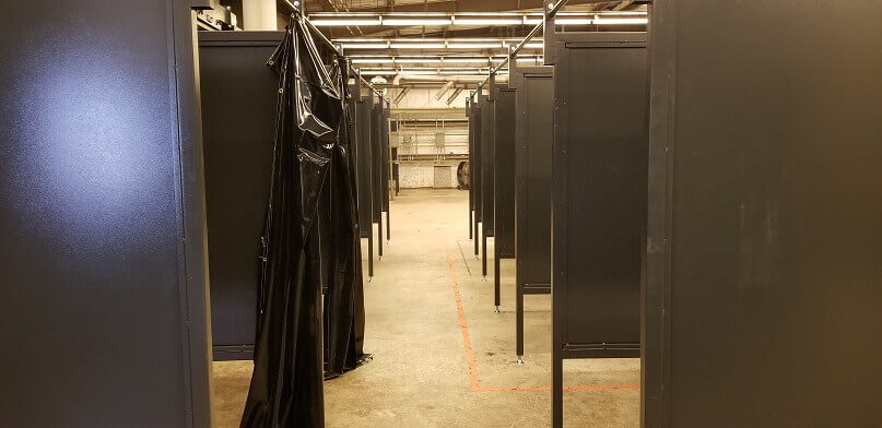 Welding Booths shown in high school workshop.